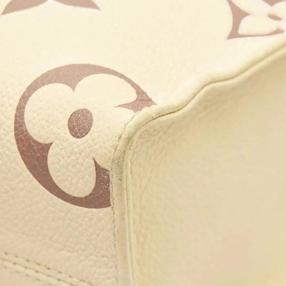 Louis Vuitton  Empreinte Monogram Giant Onthego PM Creme